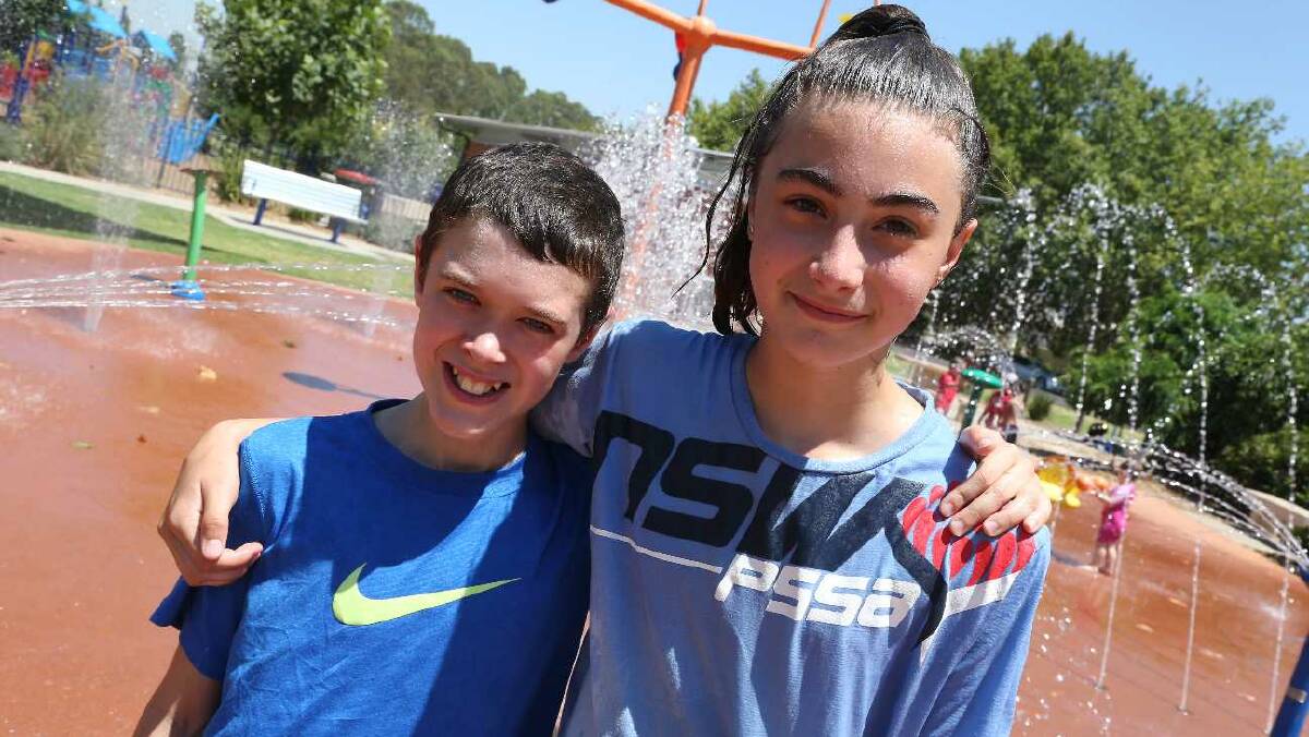 Jaxon Truscott and Darcie Carnell, both 11, at City Park in Griffith. Picture: Anthony Stipo