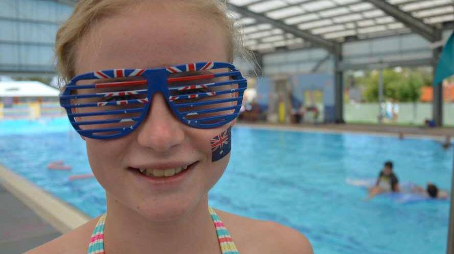 Cautlin Guinan, 12, is well into the Australia Day spirit at Junee. Picture: Declan Rurenga