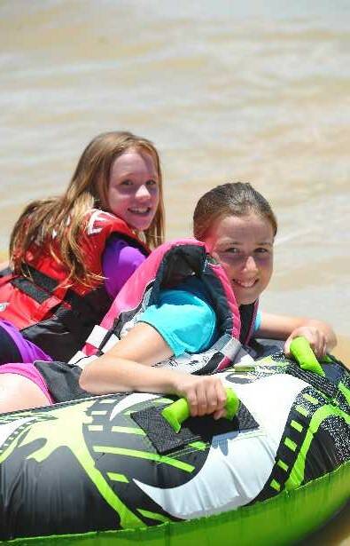 Charlize Murdoch, 9, and Tiffany Irlam, 11, are ready to go on Lake Albert. Picture: Addison Hamilton