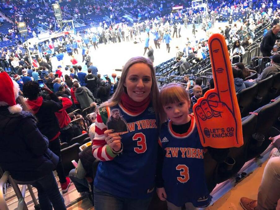 HAVING A BALL: Cristy and Lucy celebrated Christmas Day by attending a New York Knicks basketball match at Madison Square Garden.