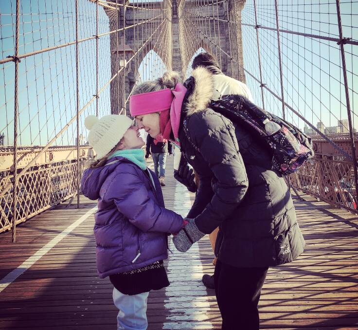 LOVE: Lucy and Cristy Jacka share a moment on the Brooklyn Bridge in New York. 