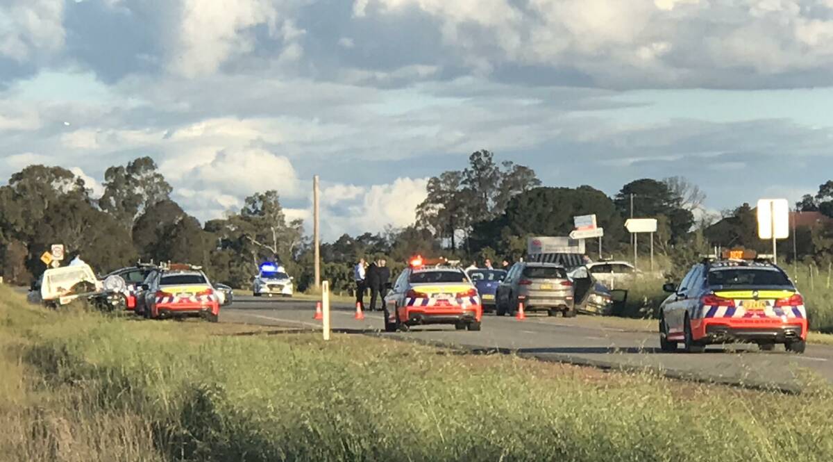 Numerous police vehicles at the intersection of Old Narrandera and Pine Gully roads following the alleged pursuit on Sunday afternoon. Picture: Jessica McLaughlin