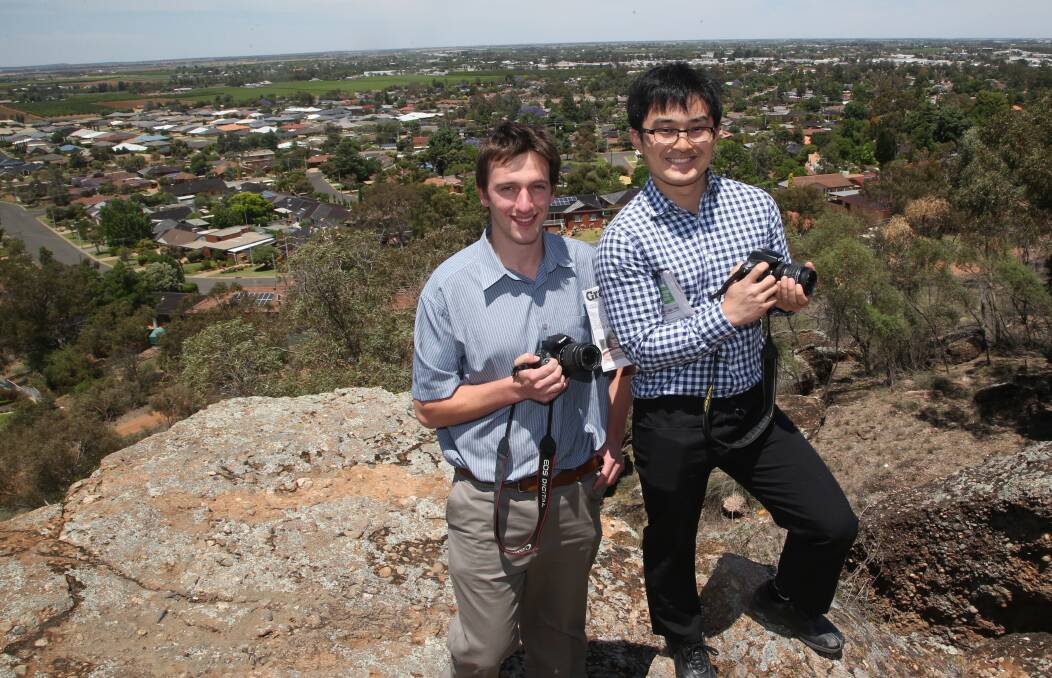 THIS JUST IN: Reuben Wylie and Kenji Sato take in the view of Griffith from Scenic Hill. Picture: Anthony Stipo