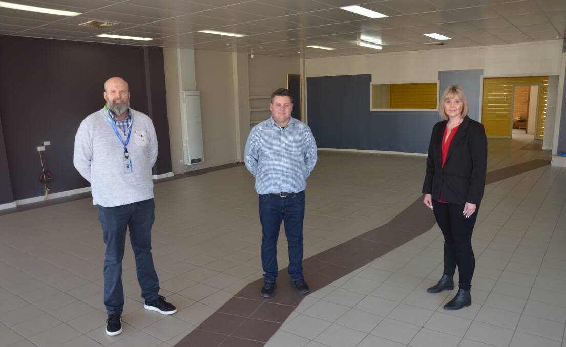 ROOM TO GROW: Norm Corcoran, Mathew Berttram and Deanne Bolesta inside the building which will be Kurrajong's new office in Griffith. PHOTO: Declan Rurenga