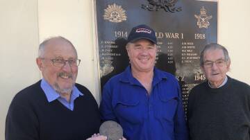RETURNED: Paul King (centre) donates the 'dead man's penny' medallion for Alan McGregor Whyte to Griffith War Memorial Museum's Theo Bollen and chairman Garry Smellie. PHOTO: Declan Rurenga