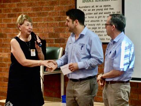 LOUD AND CLEAR: Griffith U3A Dianne Robinson receives the donation from Yenda Producers company secretary Anthony Nehme and managing director Peter Calabria. PHOTO: Pam Kensett-Smith