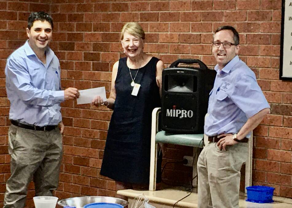 LOUD AND CLEAR: Griffith U3A Dianne Robinson (centre) receives the donation from Yenda Producers company secretary Anthony Nehme (left) and managing director Peter Calabria from Yenda Producers. PHOTO: Pam Kensett-Smith