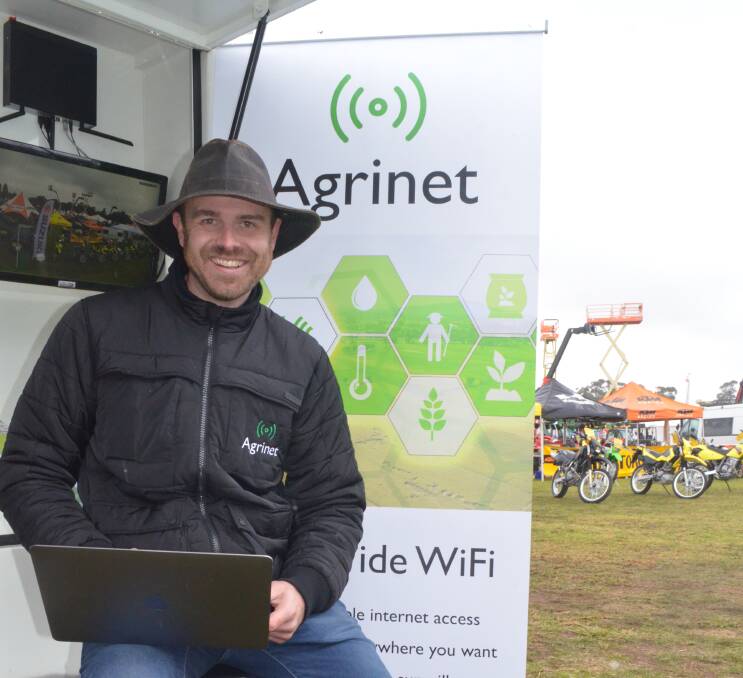WIFI NETWORK: Agrinet founder Dan Winson tests his technology at the Riverina Field Days. PHOTO: Declan Rurenga