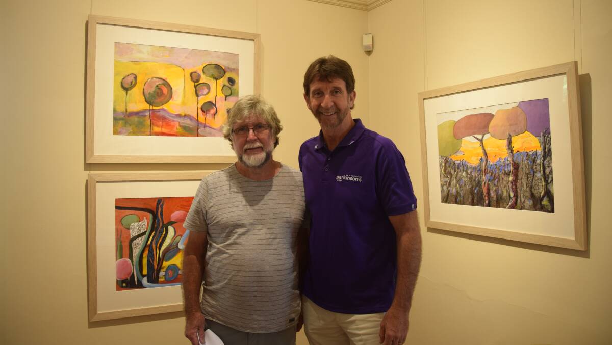 Charles Sturt PhD candidate Vince Carroll (right) with artist and Parkinson's NSW support group member David Carroll. PHOTO: Contributed