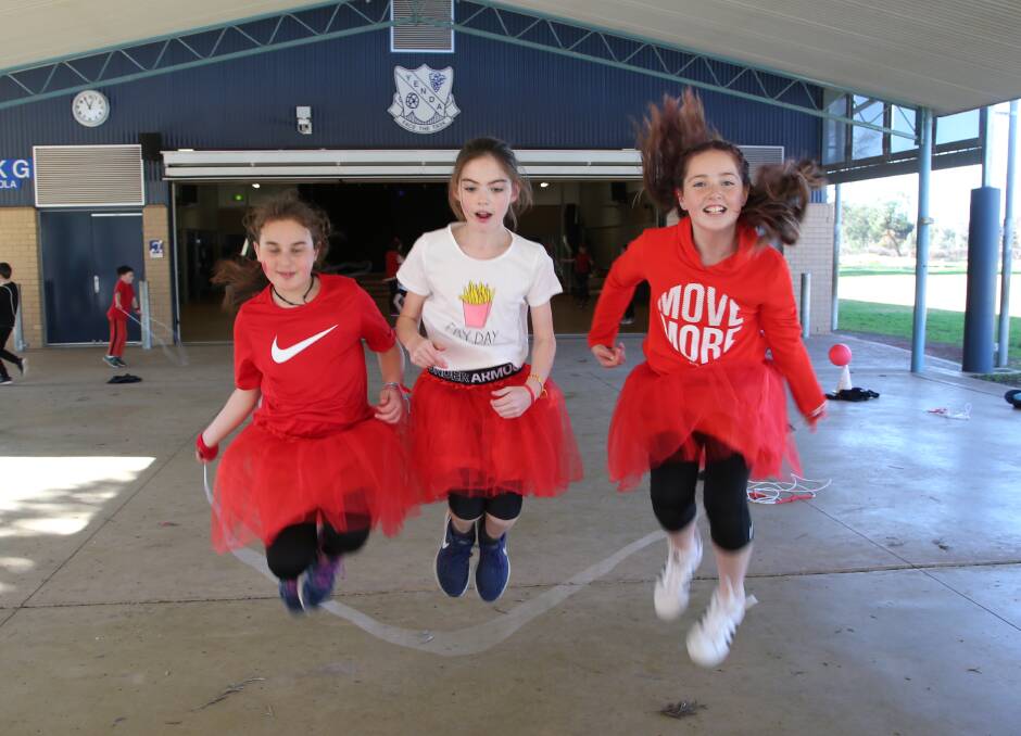 HIGHER: Yenda Publich School students Sarah Bertollo, Lili Vaccari and Kaylee Brown show off the skipping skills they've practised over the last month. PHOTO: Anthony Stipo