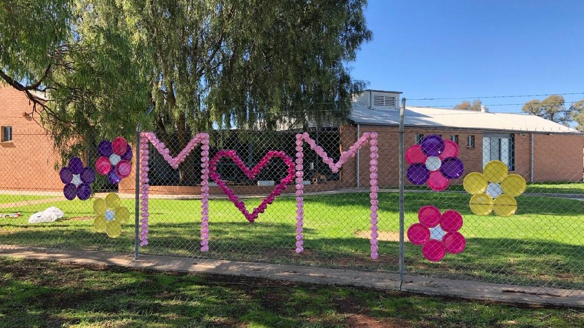 CANVAS: One of ICI Industries' mum and daughter teams created this display on Harris Road. PHOTO: Contributed