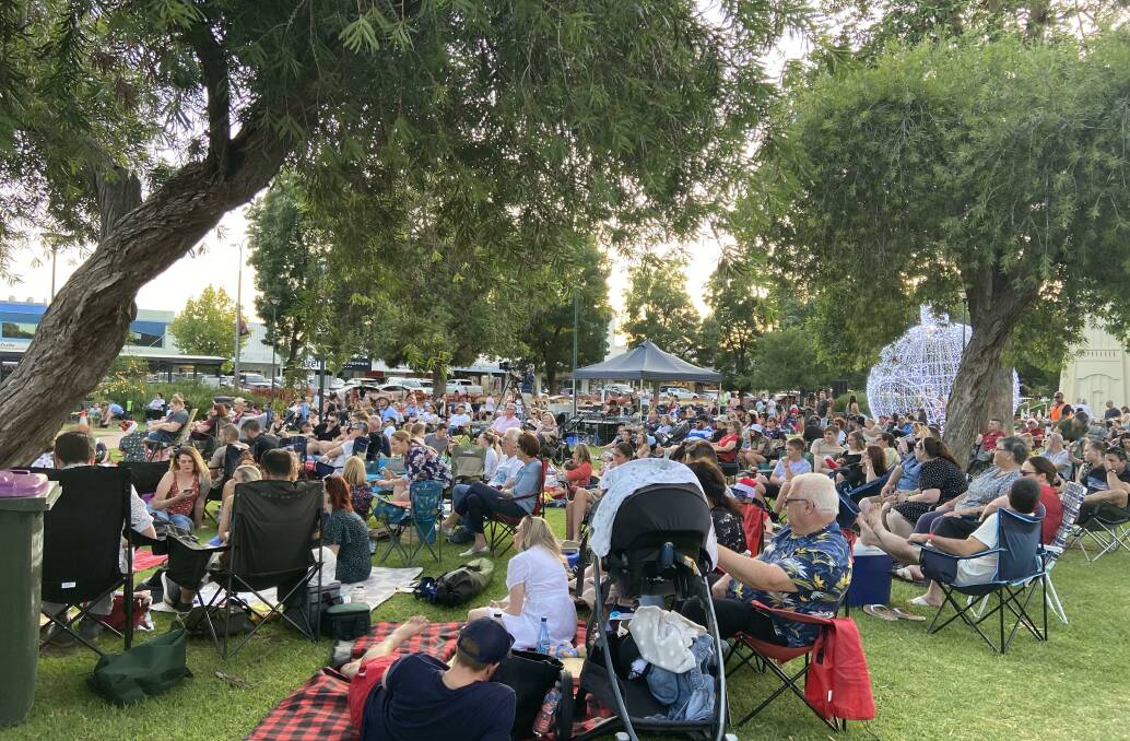 STILL POPULAR: Despite COVID rules, Griffith's Carols by Candlelight in Memorial Park last year attracted a small crowd. PHOTO: Contributed