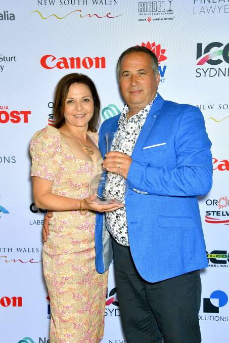 Maria and Salvatore Trimboli collect the ICC Sydney Trophy for Best Other White Variety at the NSW Wine Awards. PHOTO: Contributed