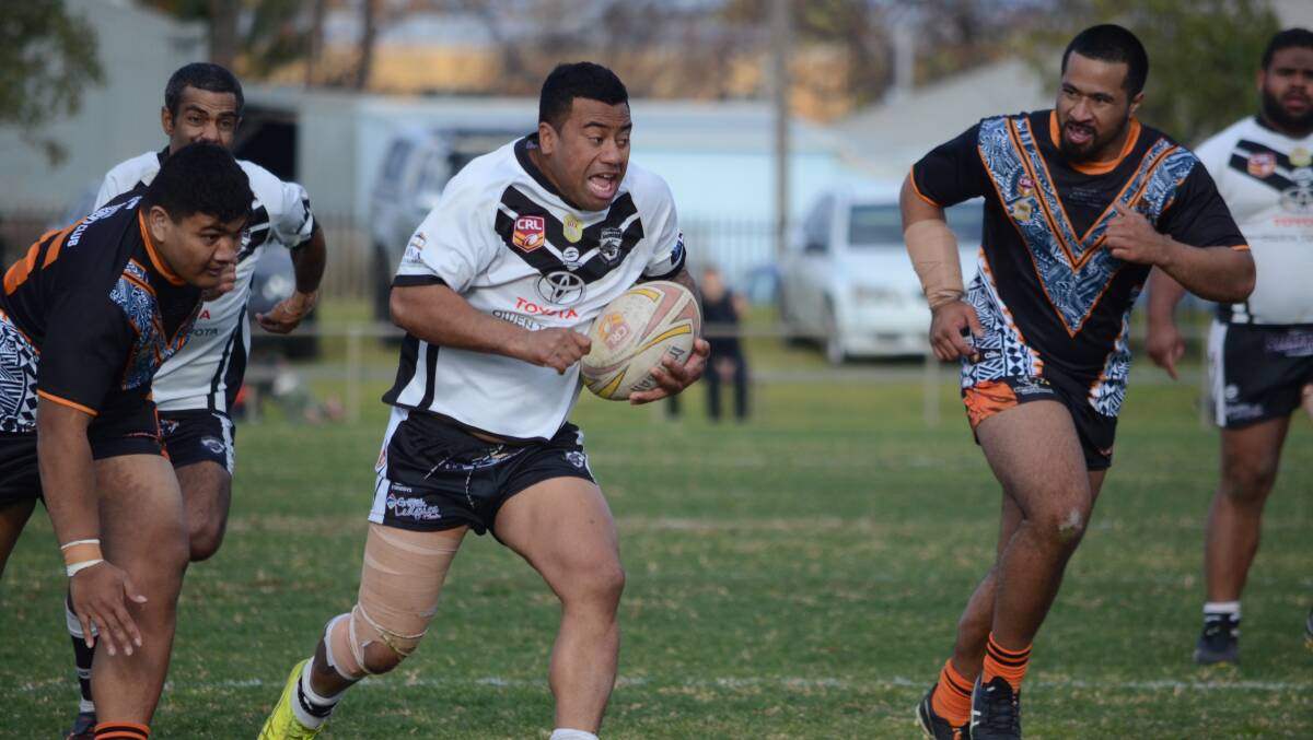 CENTENARY YEAR: Andrew Lavaka in action for the Griffith Black and Whites. PHOTO: Liam Warren