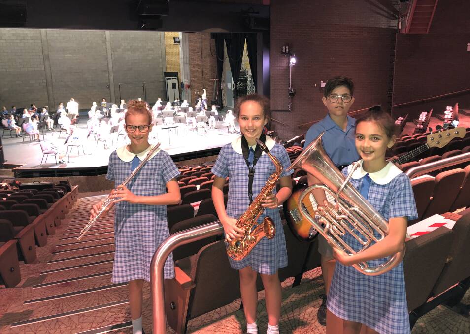 LOUD AND CLEAR: Year 5 students Mia Fattore, Lily Ceccato, Presley Young and Adele Tropeano from Griffith East Public School. PHOTO: Declan Rurenga