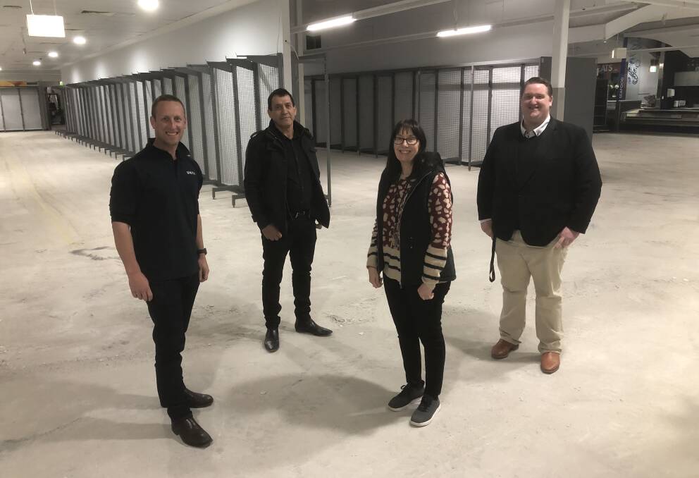 TRANSFORM: Ben Percey from fit-out and construction firm Unita group, Griffith Central owner Frank Violi, Griffith Central manager Cheryl Wood and Italian Fresh Mercato manager Brodie Duffy inside what will become the Italian Fresh Mercato. PHOTO: Declan Rurenga