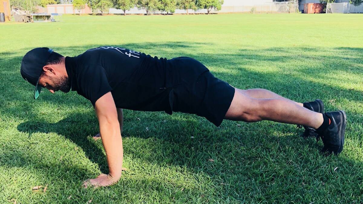 UP AGAIN: Michael De’Paoli demonstrates part of a push up. Picture: Contributed