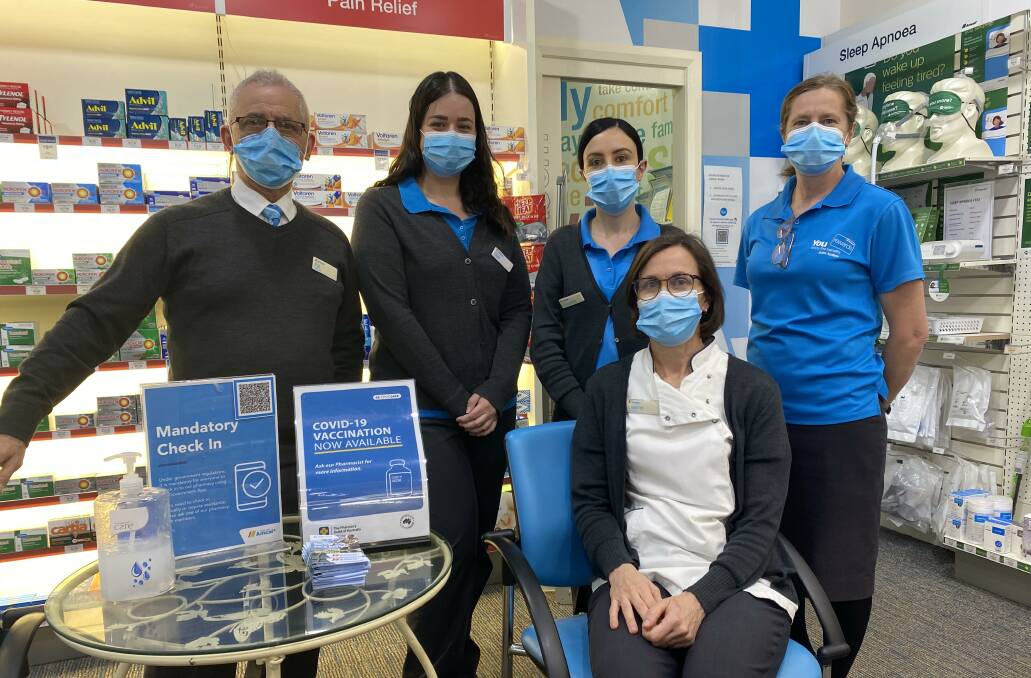 MODERNA TIMES: Griffith Amcal Pharmacy's Pat Zirilli, Elise Cappello, Chandelle Perre, Karen Edgcome-Lucas and Leanne Foley (seated). PHOTO: Lizzie Gracie