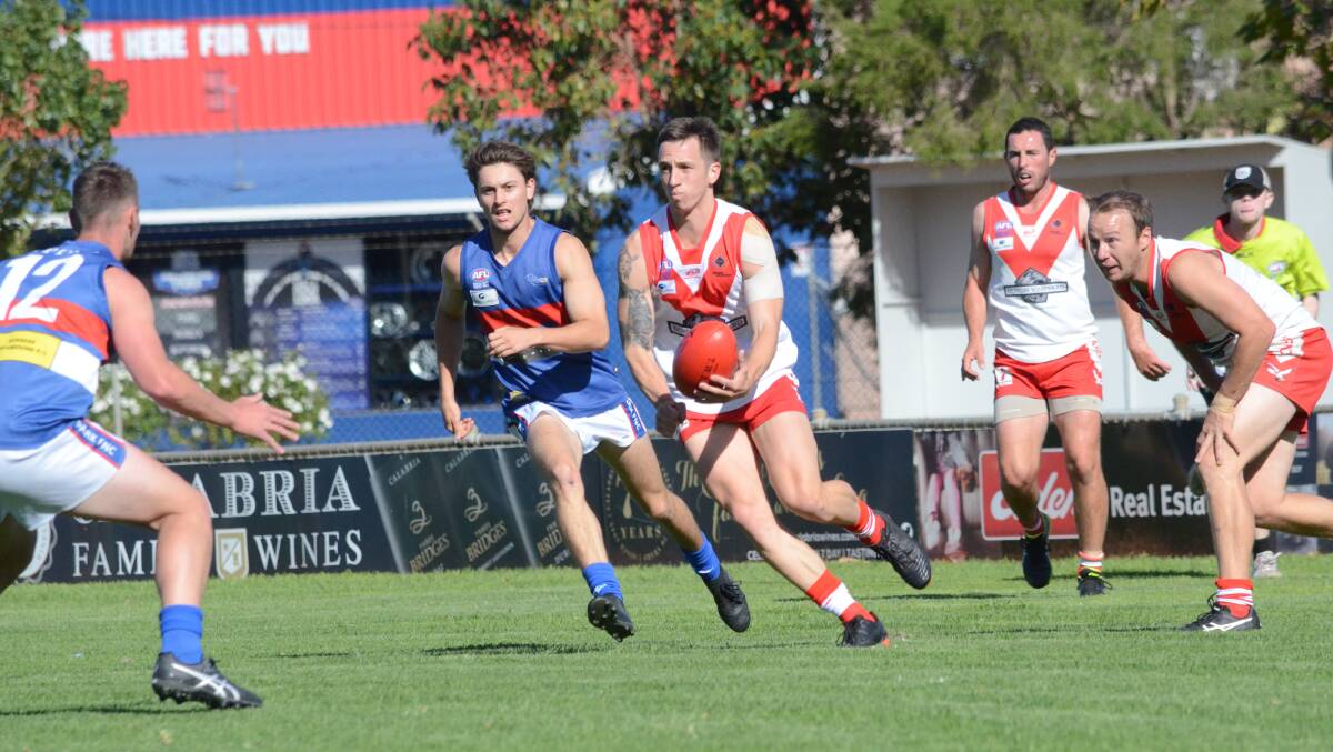 OUT: Theo Valeri in action for the Swans in 2019 - the Swans will sit this year out and a combined Riverina and Farrer leagues competition could kick off.