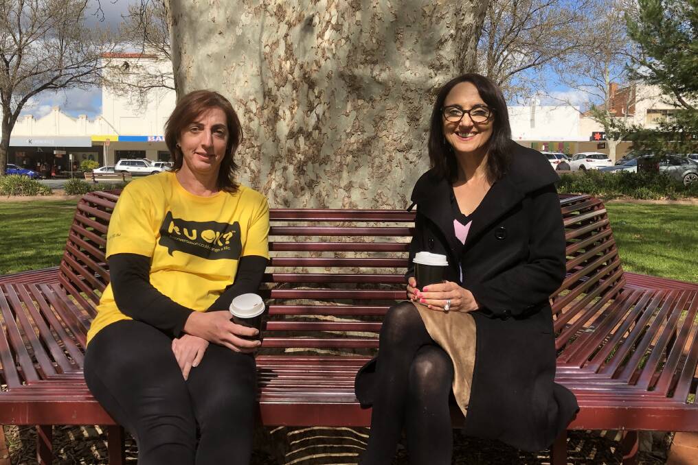 TIME TO ASK: R U OK community ambassador Karen Snaidero and LHAC member Saideh Barlow share a moment with over coffee. PHOTO: Declan Rurenga