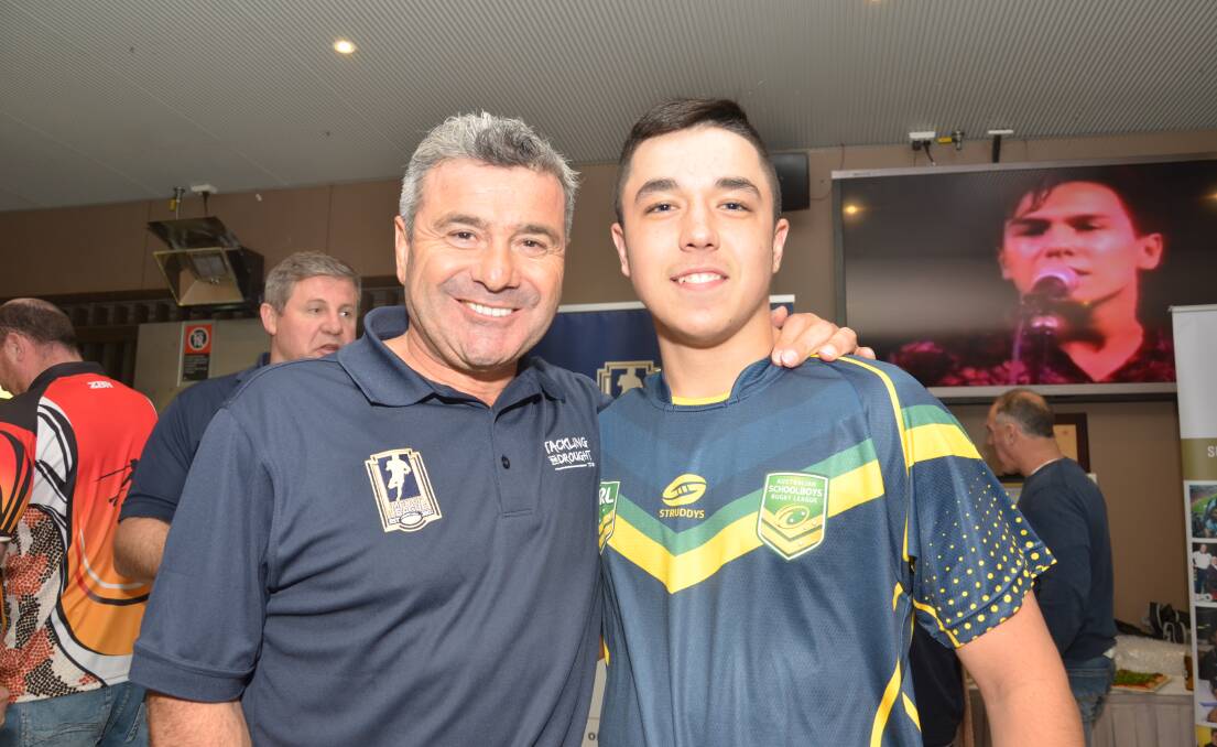 ON TOUR: Former Australian and Balmain hooker Ben Elias with Griffith's Daniel Parisotto at the Griffith Leagues Club. Picture: Declan Rurenga