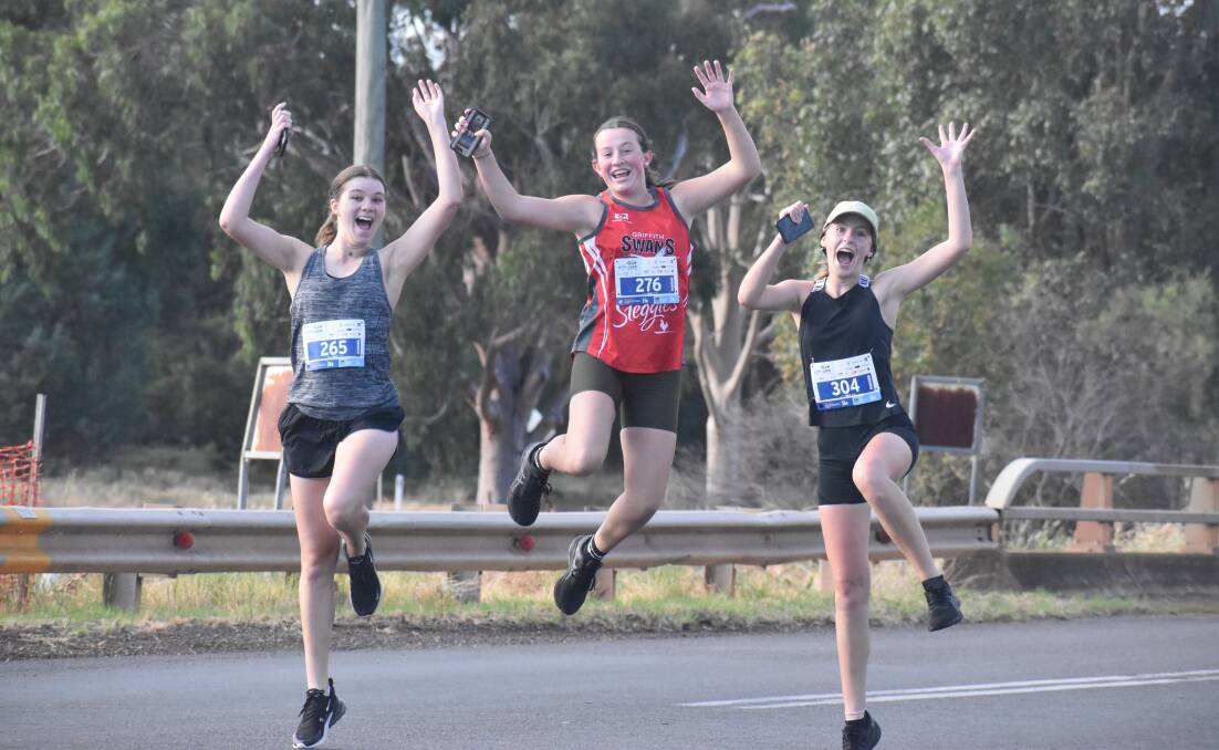 ON THREE: Rianna Scarfone, Emmerson Waide and Bree Woodhouse during the City2Lake fun run on Sunday. PHOTO: Liam Warren