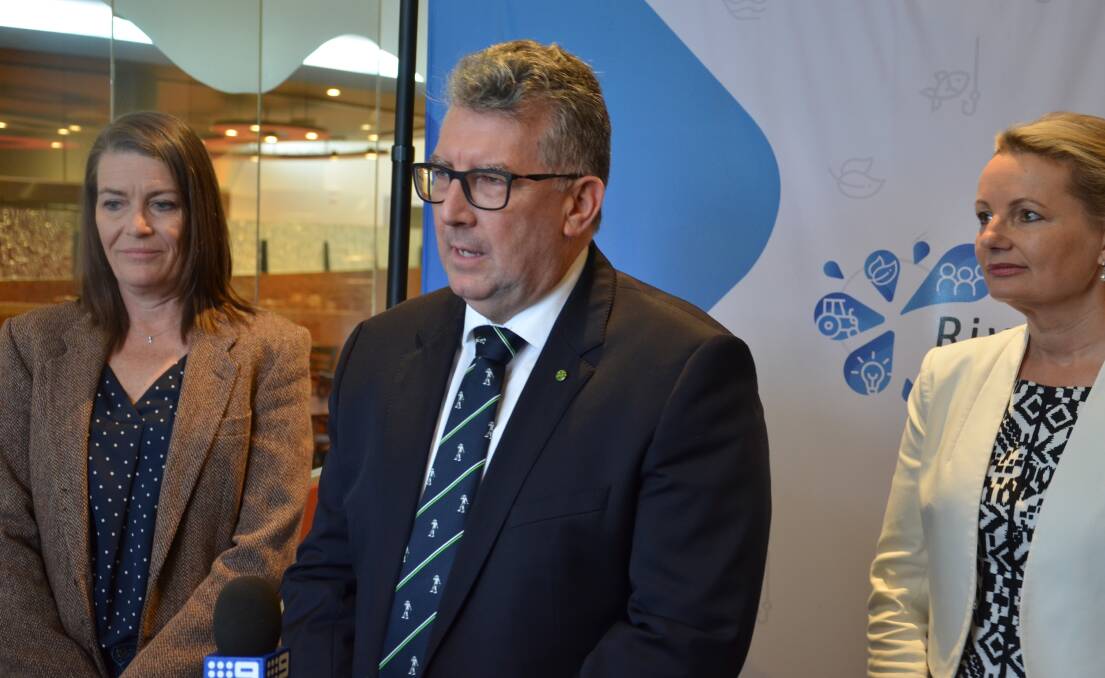 Minister for Resources, Water and Northern Australia Keith Pitt addresses the media at the MDBA's River Reflections conference flanked by Senator Perin Davey (left) and Member for Farrer Sussan Ley. PHOTO: Declan Rurenga