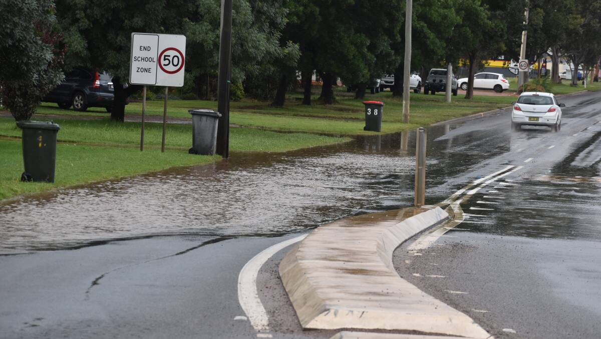 SET SAIL: Water pools on Willandra Avenue on Monday following a wet weekend in Griffith and the region. PHOTO: Liam Warren