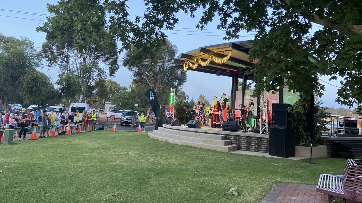 PHYSICALLY DISTANCED: Griffith's Carols by Candlelight in Memorial Park in 2020, organisers are planning for a much larger crowd this year. PHOTO: Contributed