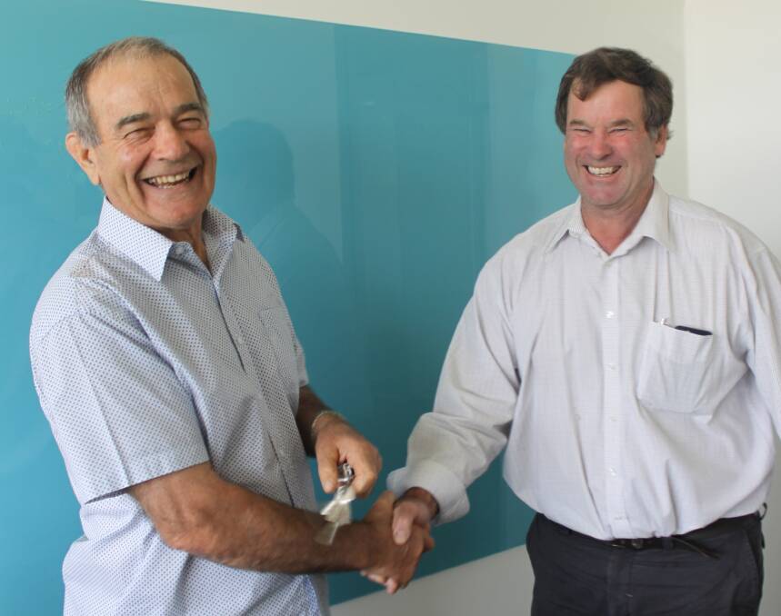 CHANGE IN THE AIR: Outgoing Murrumbidgee Irrigation chairman Frank Sergi(left) hands over to new chairman Nayce Dalton. PHOTO: Contributed