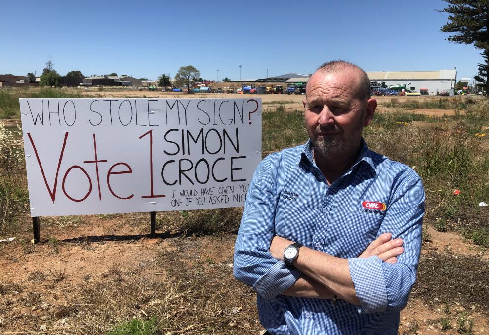 HOME MADE: Councillor Simon Croce is worried thieves have targeted his election signs, with one of the largest going missing. PHOTO: Declan Rurenga