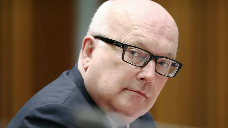 Attorney-General Senator George Brandis will launch a police taskforce to work with the royal commission on union corruption. Photo: Alex Ellinghausen