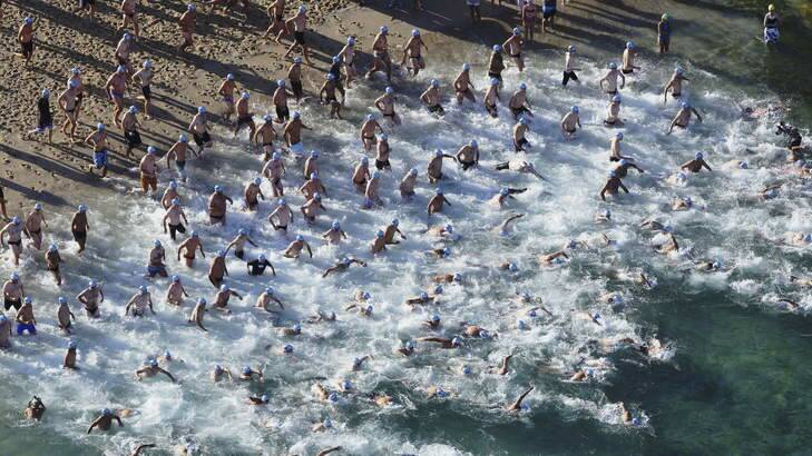 They're off .. the start of the  2014 Sydney Morning Herald Cole Classic Ocean Swim. Photo: James Brickwood