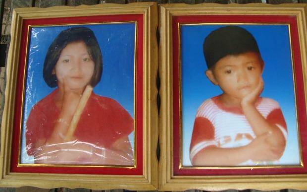 Looking for water: Hut Heap, 13, and her brother Hut Hoeub, 9, drowned in a pond in the Battambang resettlement camp.