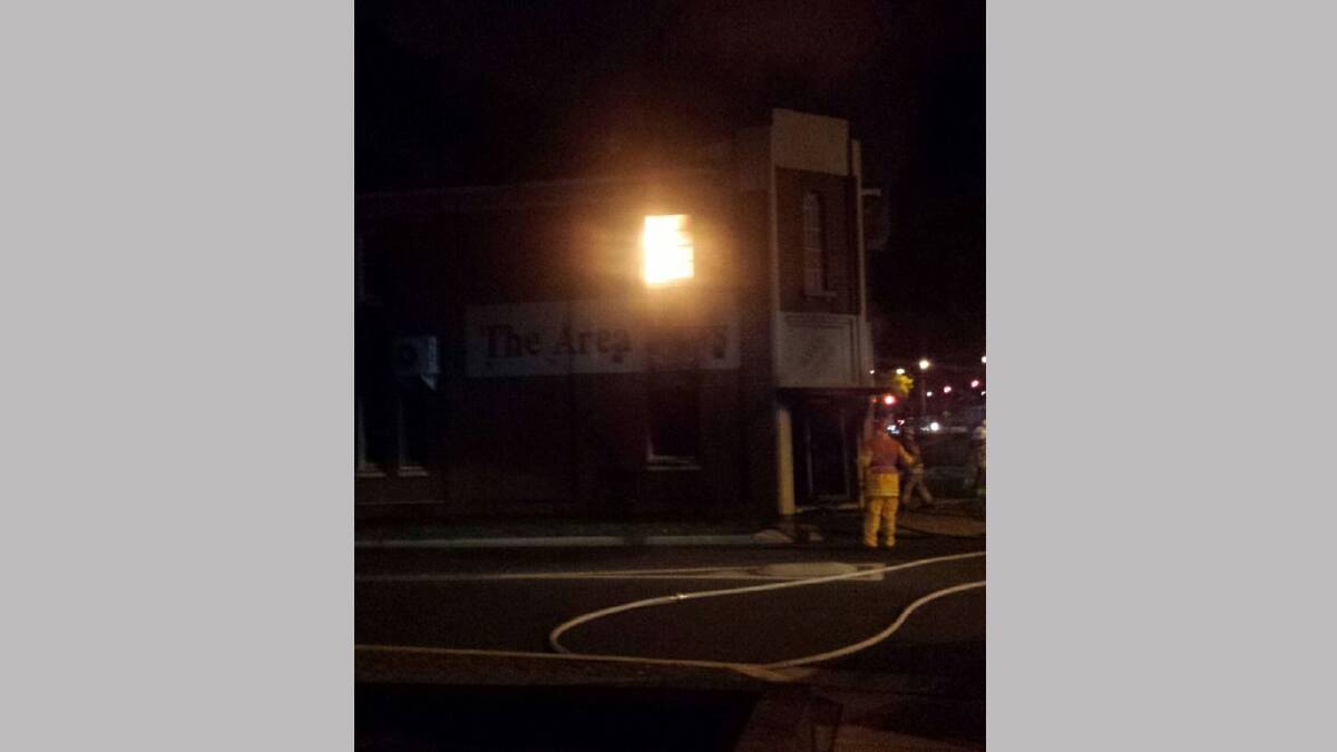 Parts of The Area News building have been completely destroyed by fire as firefighters work to extinguish the blaze. Picture: Contributed