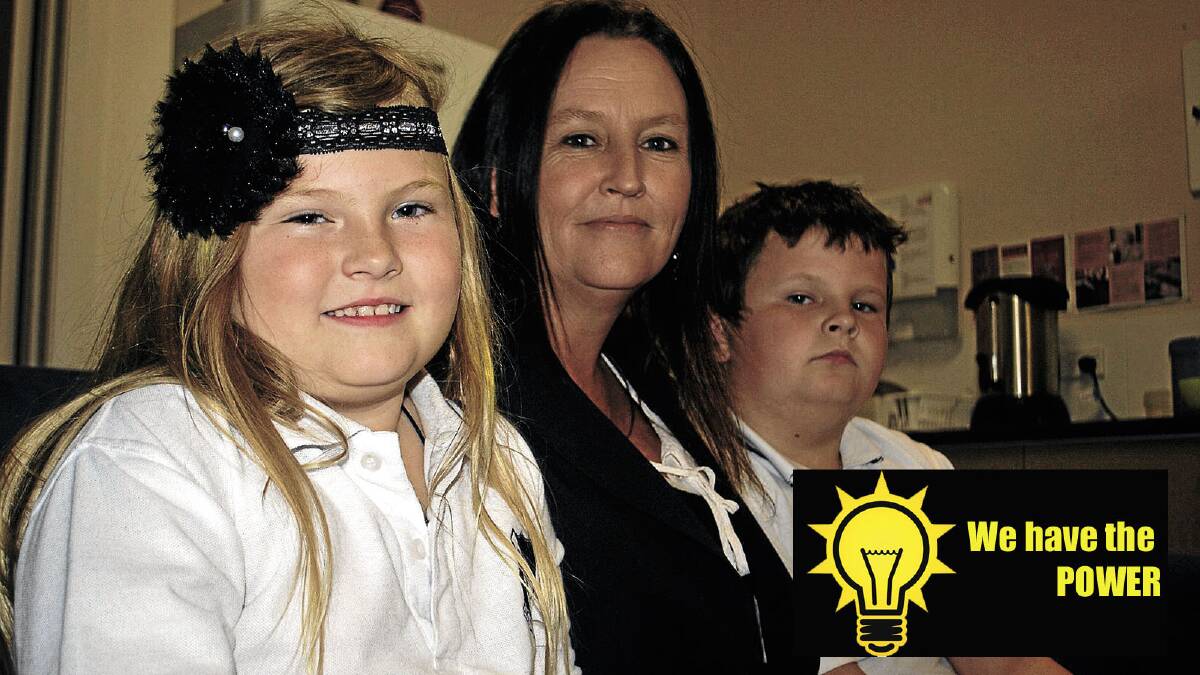 TOO MUCH: Yvette Stewart with Savannah, 7, and Ned, 10 have joined the Big Griffith Switch after suffering years of increasing energy bills.