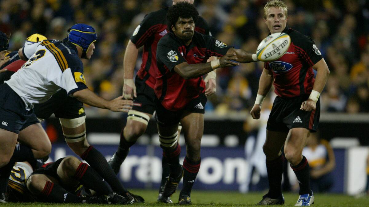 IN DEMAND: Ex-Fiji international star Marika Vunibaka, pictured here unloading for the Crusaders in the 2004 Super 12 final in Canberra, looks set to play for either the Blacks or the Black and Whites this year after moving to Griffith.