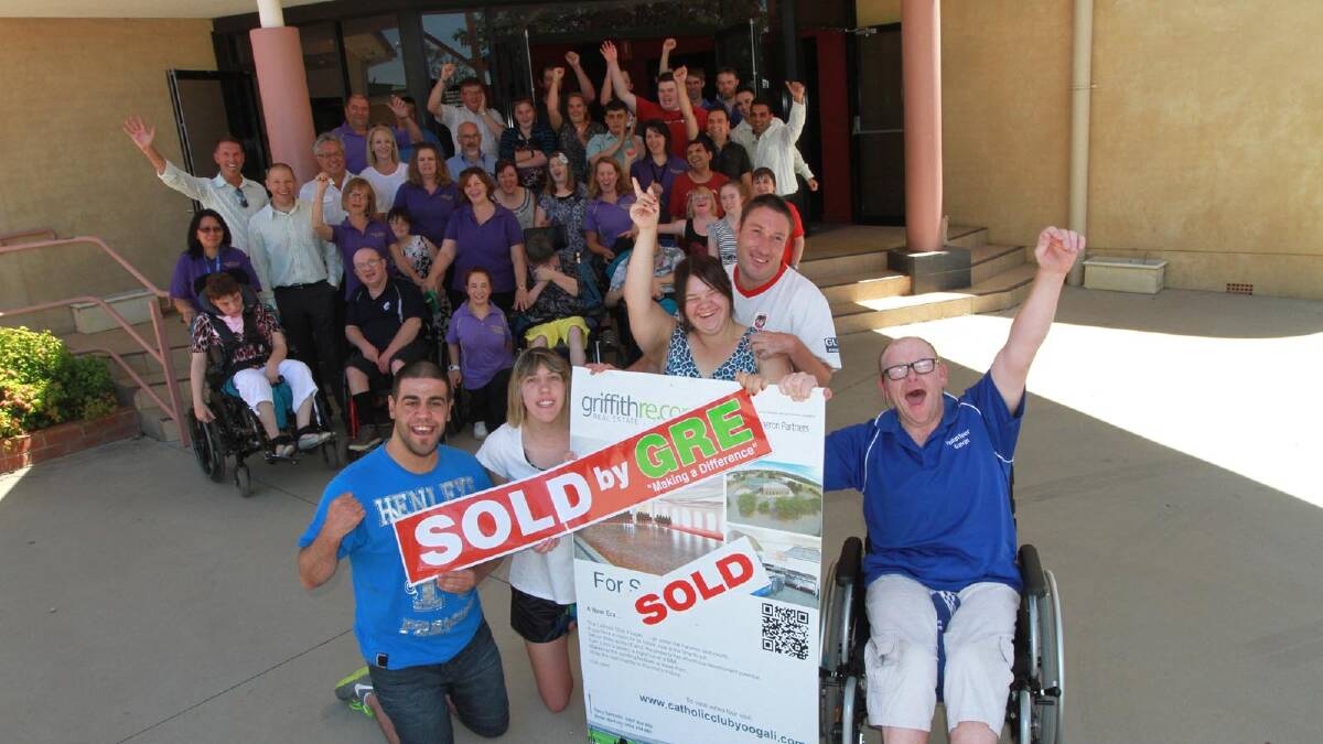 The Post School Options team, with Griffith Real Estate, celebrate their new home.