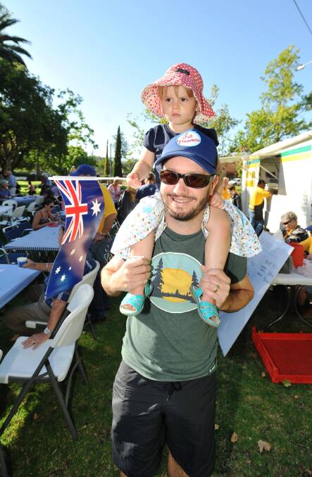 Jason with Evie, 2, Thiem at the Australia Day Celebrations in Narrandera. Picture: Alastair Brook