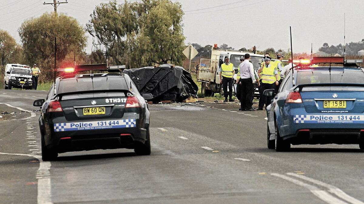 TRAGIC END: The aftermath of a fatal accident near the North Kooba Settlers Road intersection, on Thursday. Local residents have renewed calls for the intersection to be upgraded.