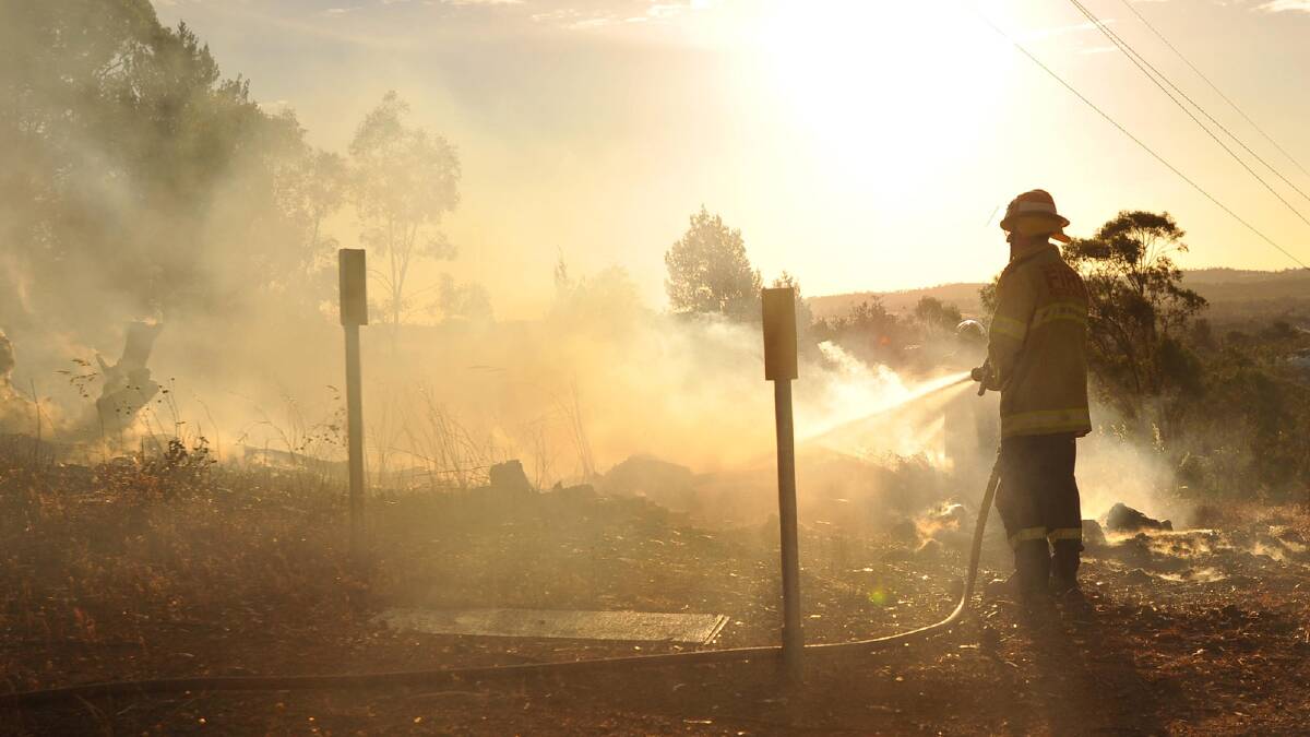 Firefighters put out a blaze on Willans Hill. Picture: The Daily Advertiser