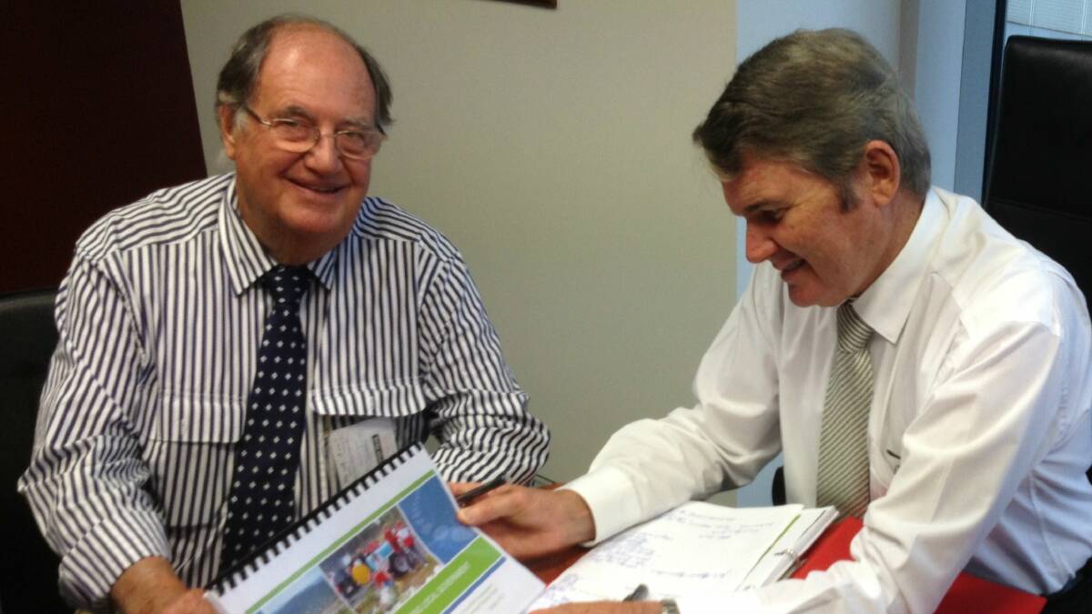 MERGER TALKS: President of Western Division Council and mayor of Carrathool Peter Laird speaks to the Minister for Local Government Don Page about the proposal to merge Carrathool and Murrumbidgee shires with Griffith