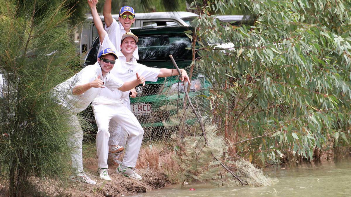  Exies A Grade cricketers Jamie and Justin Winkler and Theo Valeri have to retrieve the ball from the golf club dam during a match at Wade Park. Picture: The Area News