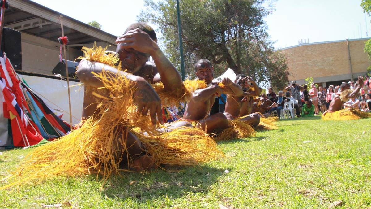 Fijian dancer Jolame Seduadua entertaining the crowds at Griffith's Multicultural Festival. Picture: Anthony Stipo