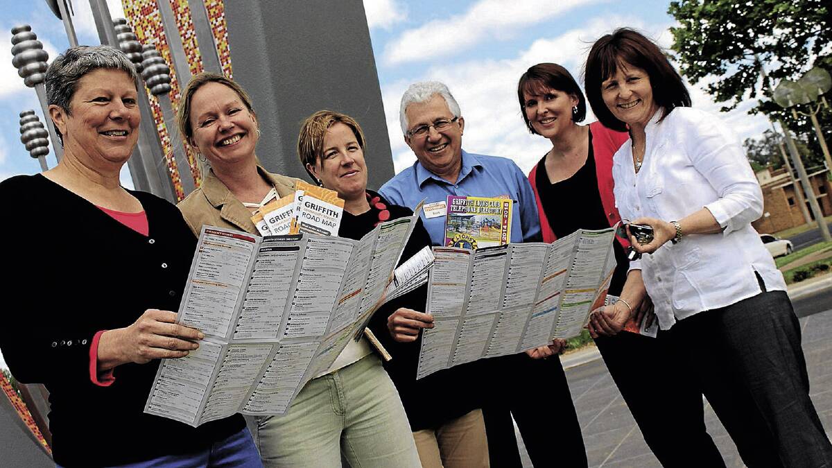 HANDY TOOL: Checking out the new Griffith Community Services Road Map are (from left) Griffith City Council’s Johanna Botman, Griffith Neighbourhood House’s Barb Peninga, Griffith Connections’ Marg Andreazza, Ross Catanzariti from the Lions Club, Leah Walsh from The Articulate Pear and Peta Dummett from Griffith City Council.