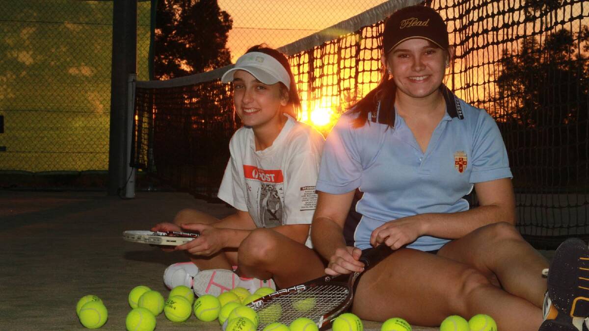 Local tennis players Megan Polkinghorne, 17, and Annaliese Quarisa, 13, prepare to take on some tough competition at a national tournament in Griffith this month.